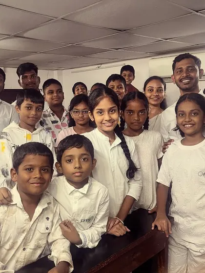 A group of our younger students celebrating the first day of Navratri in white.
