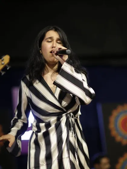 Deep in the zone during a live performance. Every song has a story, and my job is to convey that emotion to the audience.