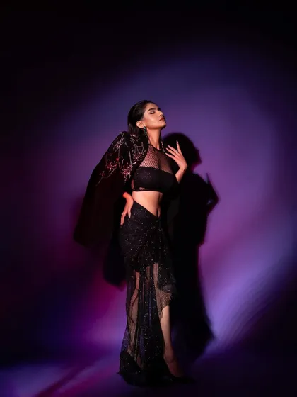 A dramatic, full-length portrait of Anushka Sen for a GQ 'Men of the Year' feature. I used colored gels and hard shadows to create a moody, high-fashion vibe.