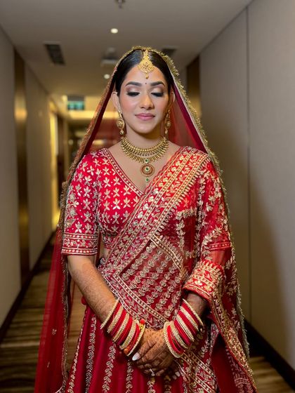 Eyes closed, this shot highlights the soft, shimmery eyeshadow we chose to complement her gold jewelry.