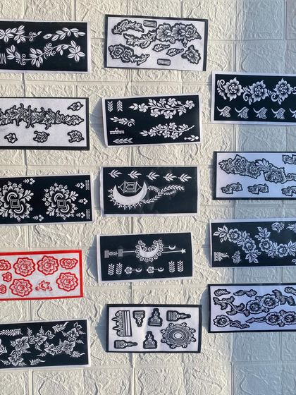 A selection of my medium-sized stencils, showing the wide variety of designs available, from floral bands to crescent moons.