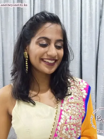 This is my signature soft bridesmaid glam. This lovely client chose a super soft smokey eye with a dewy glow and a beautiful bold lip for her sister's pheras. It's a timeless look that enhances without overpowering.