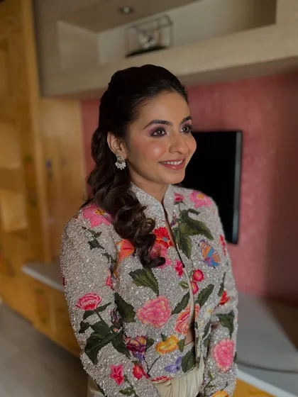 A candid, smiling shot that shows her personality shining through.