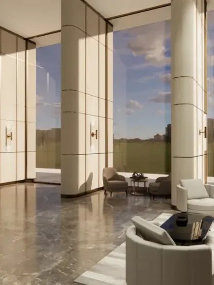 This expansive lobby is designed to inspire awe. Soaring columns, polished marble floors, and floor-to-ceiling windows create a grand entrance that sets a tone of luxury and sophistication for the entire building.