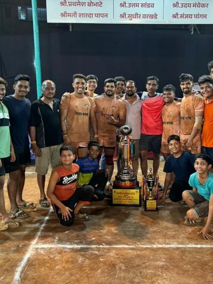 Our team with the trophy after winning the district-level tournament organized by Young Vijay Krida Mandal.