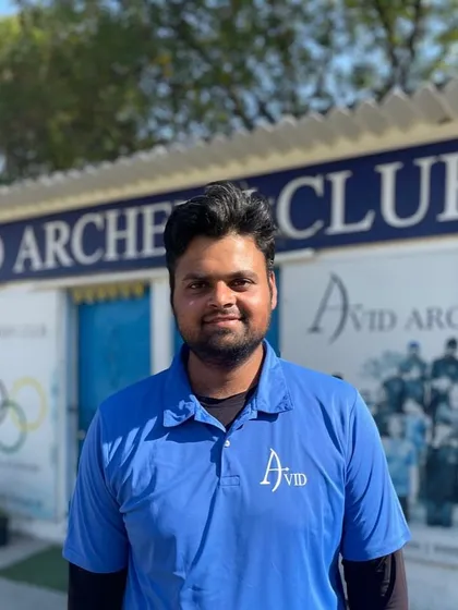 A portrait of our head coach, Ankit Yadav, at the Avid Archery Club. His leadership and passion are the driving force behind our success.