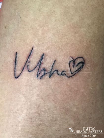 The name "Vibha" written in a signature script that flows into a heart, a popular and elegant design choice.