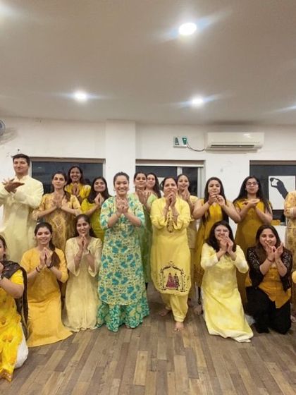 Our wonderful group of dancers after a Kathak workshop, all in the traditional 'namaskar' pose to show respect for the art form.