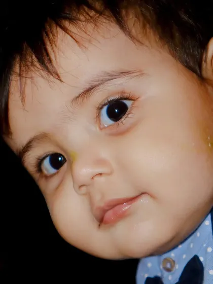 An intimate close-up portrait of my nephew, Ibrahim, capturing the innocence and curiosity in his big, beautiful eyes. I believe the most powerful kids' portraits are the ones that feel up-close and personal.