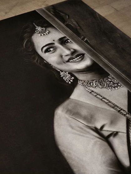 A close-up detail shot of the traditional portrait, highlighting the intricate jewelry and the soft smile.