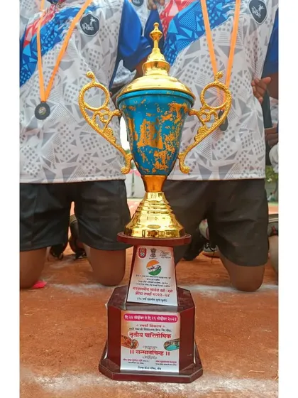 A close-up of the third-place trophy from the state-level school competition.