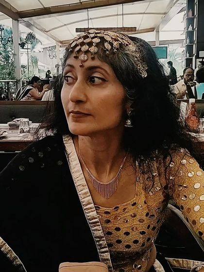 A candid moment in costume before a performance of "No Strings Attached." The transformation into a character begins long before stepping onto the stage.