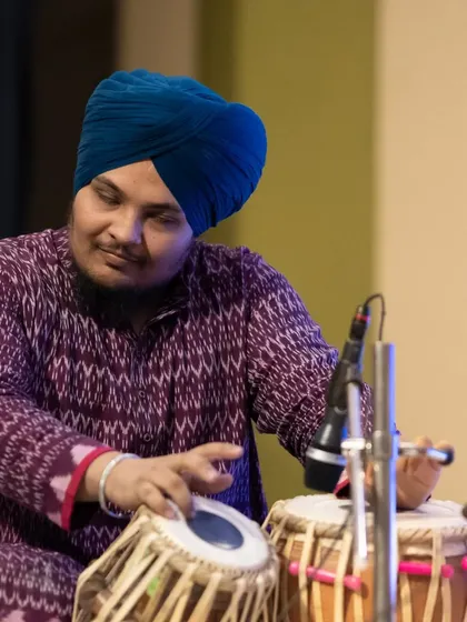 In my element during a live performance at the 'Guruvandan 2024' concert. There is a special energy in playing for a live audience, where the music connects everyone in the room.