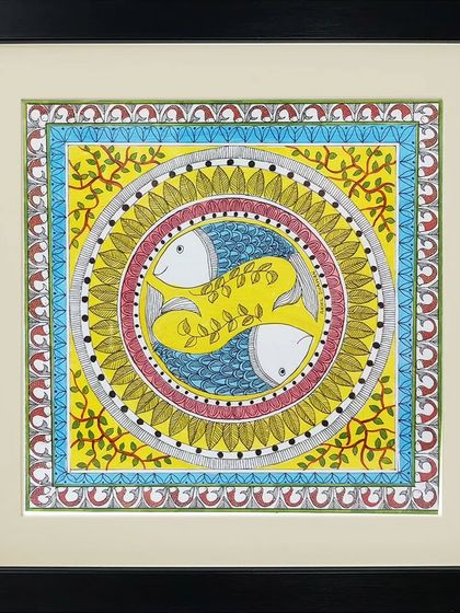 A beautiful Madhubani composition of two fish swimming in a circle, symbolizing life and continuity.