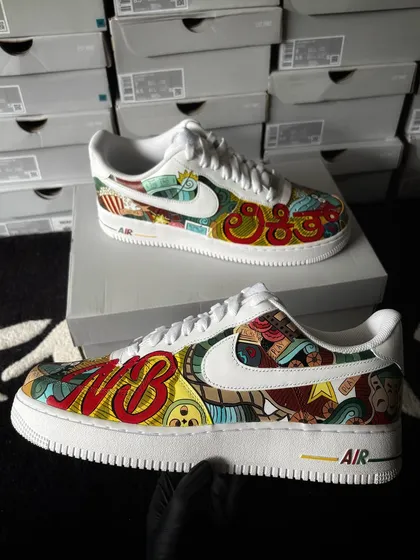 The cinema-themed sneakers held up, showcasing the detailed doodle art.
