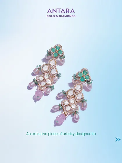 This is an exclusive piece of artistry designed to capture attention. These Polki and emerald earrings, with their delicate pearl and gemstone drops, are a testament to unmatched elegance and craftsmanship.