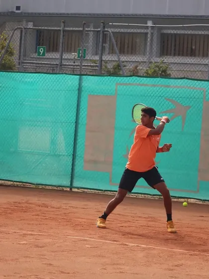 Tavish Pahwa executing a powerful forehand on the clay courts in Europe. My program ensures players are adaptable and skilled on all surfaces.