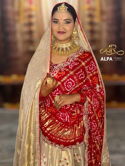 A frontal shot capturing the complete royal look. Notice the balance between the heavy jewelry and the clean, radiant makeup that enhances her natural features.