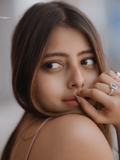 A classic beauty close-up, focusing on the model's soft expression and features. This type of shot is perfect for a beauty or skincare campaign.