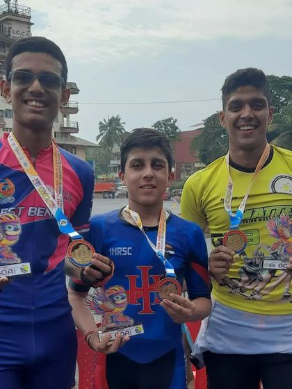 Celebrating a hard-earned victory. My students showing off their medals and trophies after a successful run at the National Ranking Championship.