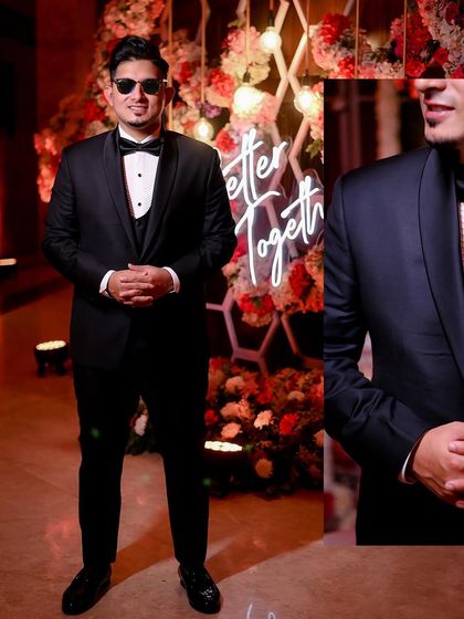 The groom posing in front of a "Better Together" neon sign, perfectly setting the mood for the celebration.