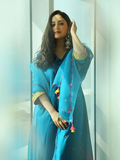 A traditional look for Yami Gautam during 'Dhoomdham' promotions. I did the makeup for this look, focusing on fresh, glowing skin and a soft pink lip to complement her beautiful blue outfit.