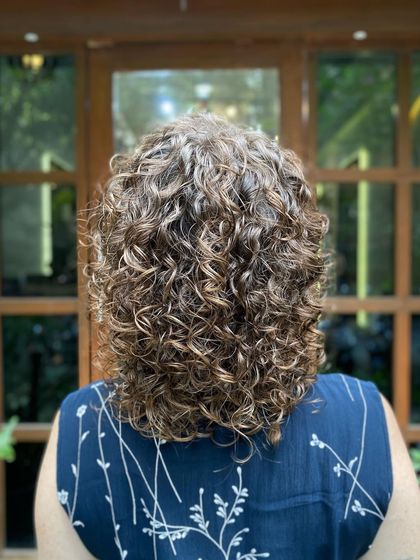 A gallery of my wonderful clients flaunting their unique and beautiful curls. Every curl pattern is different, and I love celebrating them all.