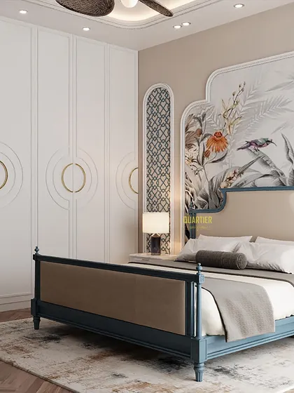 This view of the Indochine master bedroom shows the full-height wardrobe with custom circular handles. The white PU finish provides a clean contrast to the rich textures and patterns in the rest of the room.