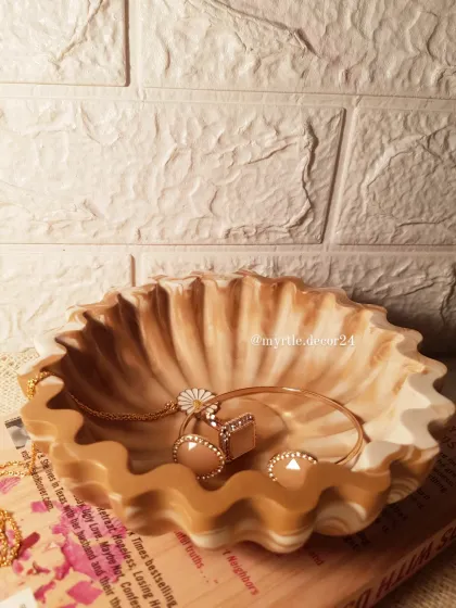 Another shot of the floral bowl, highlighting the fluid, organic shape of the rim. Every piece has a slightly different marble pattern, making yours one-of-a-kind.