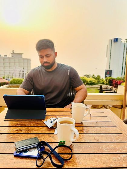 Working from a rooftop cafe. Finding the perfect balance between my legal work and enjoying the moment is what keeps me going.
