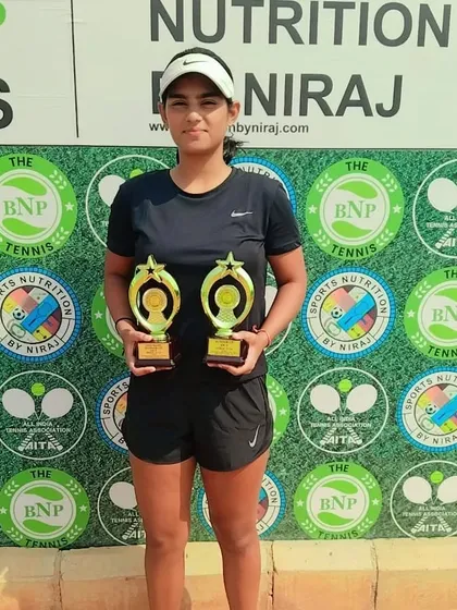 NTC's Navy Dabas with her runner-up trophies from the CS7 U-18 Girls tournament.
