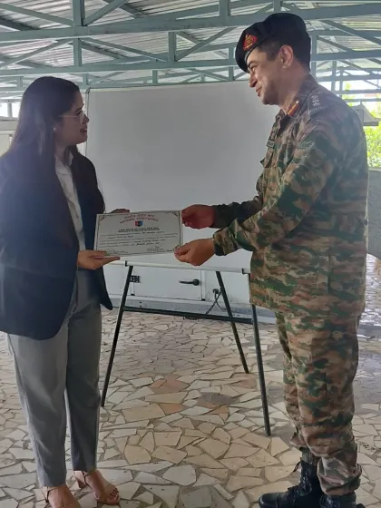 A candid shot while receiving recognition for my lecture to the cadets.