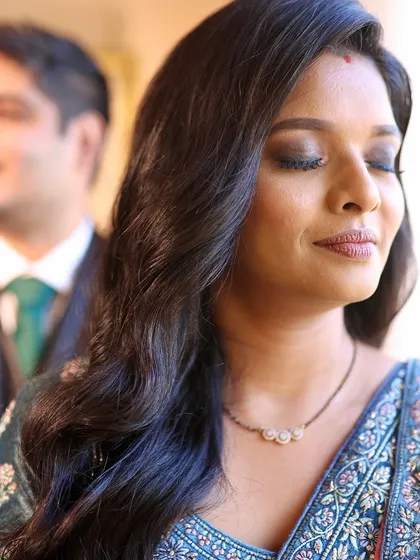 Reception ready with bold matte smokey eyes. This look was all about staying true to Pooja's beautiful features while adding a touch of evening drama.