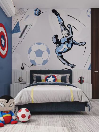 A full view of the football and superhero-themed room. The design balances bold wall art with functional furniture, creating a space that is both exciting and comfortable.
