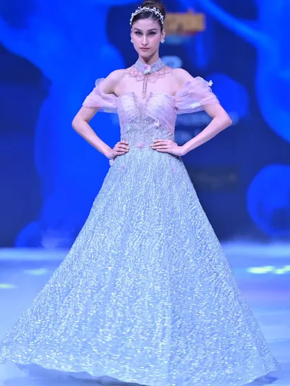 The full look of my ice-blue and pink GULFAM gown. The corset-style bodice and floral choker complete this enchanting, starlit design.