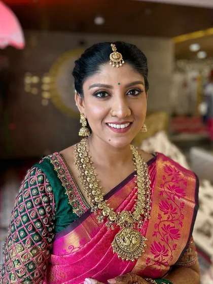 A close-up portrait showing the flawless finish of the makeup. I focus on creating a perfect canvas that enhances my client's features without looking heavy.