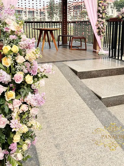 A close-up of the floral decor on the gazebo railing.