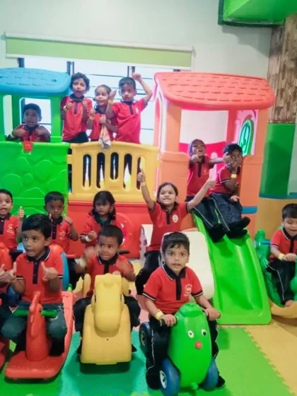 A happy group from Little Star Home School posing on our toddler-friendly play structure. My play areas have equipment suitable for various age groups, ensuring everyone has a great time.