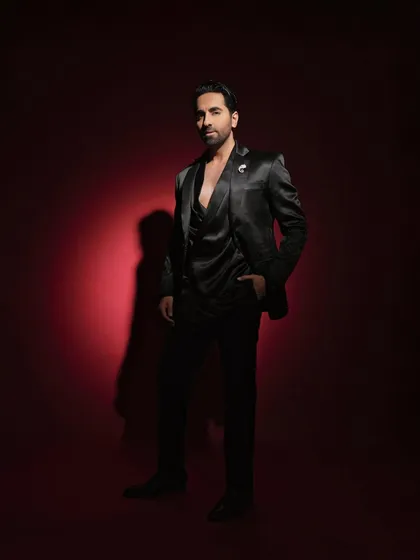 Another full-length pose from the Pinkvilla shoot, offering a different angle on the sleek, all-black ensemble.