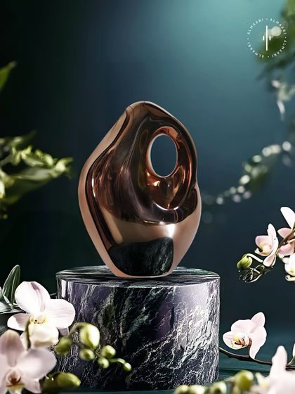 Modern art you can carry. This sculptural, metallic rose-gold clutch is a statement piece for the fashion-forward woman. It’s perfect for adding a contemporary edge to an evening gown.