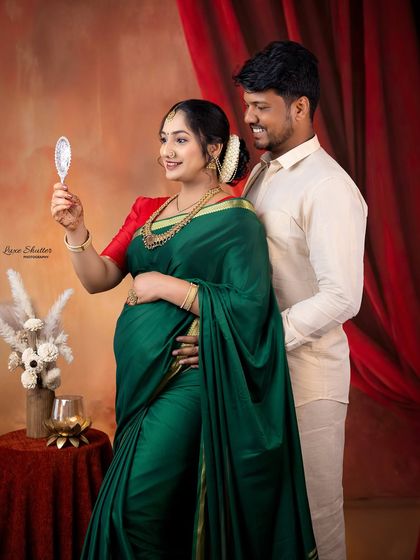 Another beautiful moment from our Raja Ravi Varma inspired series. The couple's pose and the classic props create a portrait that feels like a painting come to life.