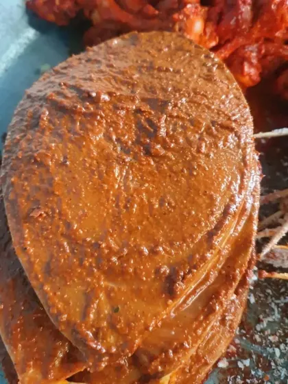 Slices of fish marinated in my special masala, ready to be fried. This is a very popular starter.