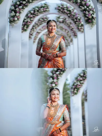 A beautiful portrait of the bride framed by floral arches, creating a dreamy and elegant photograph.