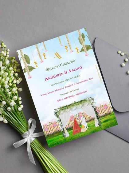 A bright and cheerful wedding ceremony invitation. This design uses a garden theme with a floral mandap and hanging traditional elements to create a feeling of open-air celebration and joy.
