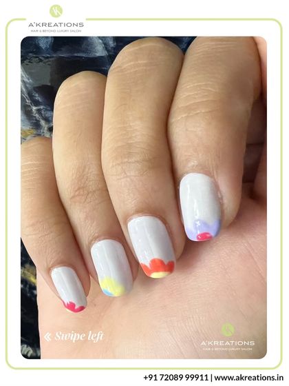 Another view of the playful floral cuticle design, showing the different pastel colors used for the petals on each nail.