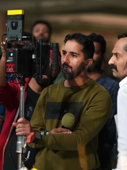 On set with Fahadh Faasil, lining up the next shot. My process involves working side-by-side with the actors to build their confidence and physical vocabulary.