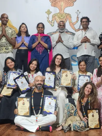 A moment of shared joy with our graduates from various programs, including the 300-hour TTC and specialized workshops. The diversity of skills and backgrounds enriches our entire community.