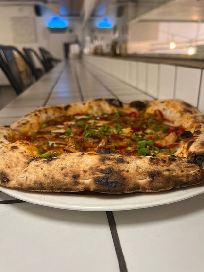 Our special Adobo Chicken pizza is calling out to you on a rainy day. It's the perfect comfort food with a spicy kick.