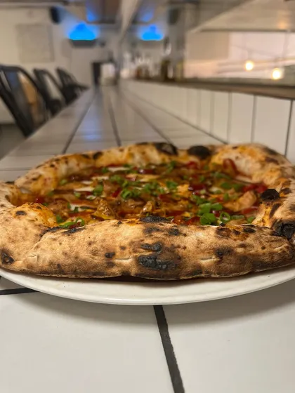 Our special Adobo Chicken pizza is calling out to you on a rainy day. It's the perfect comfort food with a spicy kick.