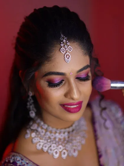 A close-up of Sahana's reception look. The intricate design of the CZ choker and the matching maang tikka are highlighted here.